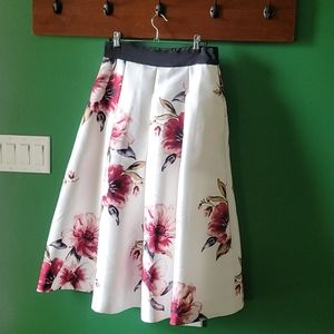Full, floral, below the knee skirt with pockets